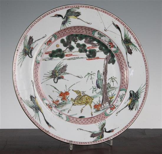 A Chinese famille verte deer and crane dish, Kangxi period, 32cm., section broken and re-stuck